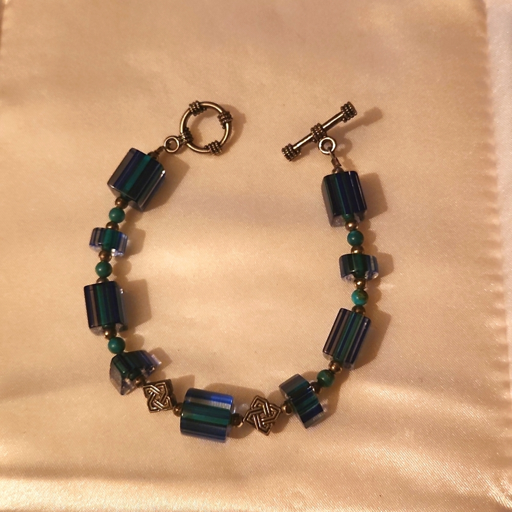 Silver bracelet with blue cyrsstals